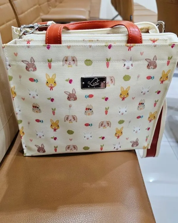 รูปจากลูกค้า — Crossbody Mellow Hopping · Pete Rabbit · ส้มเข้มแครอท (Carrot)