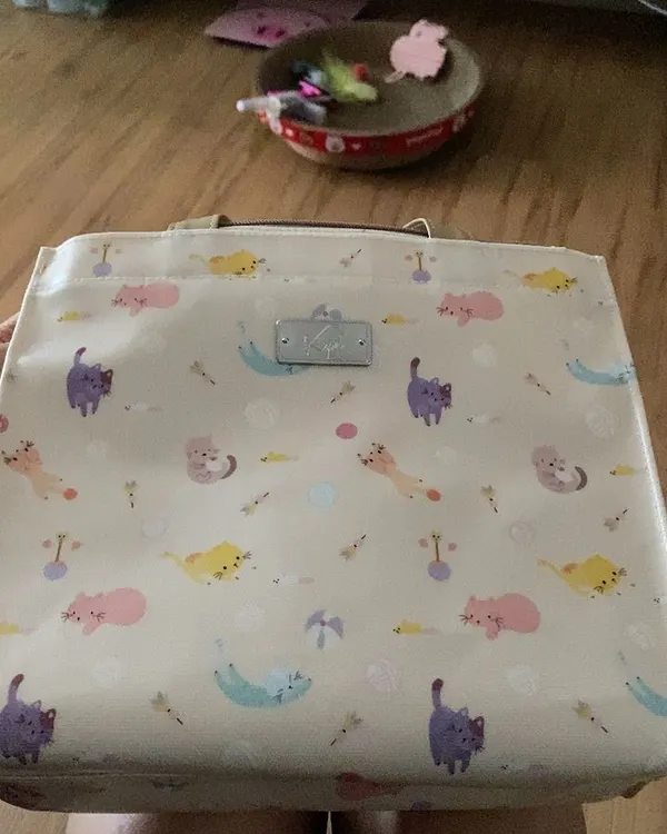 รูปจากลูกค้า — Crossbody Mellow Hopping · Rolling Cats · น้ำตาล Brown Sugar